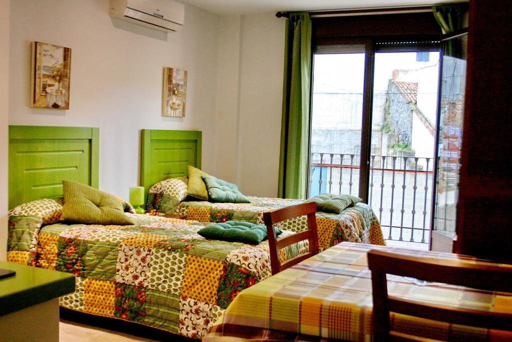 Apartamentos Turisticos Mirayuste กวาดาลูเป ห้อง รูปภาพ