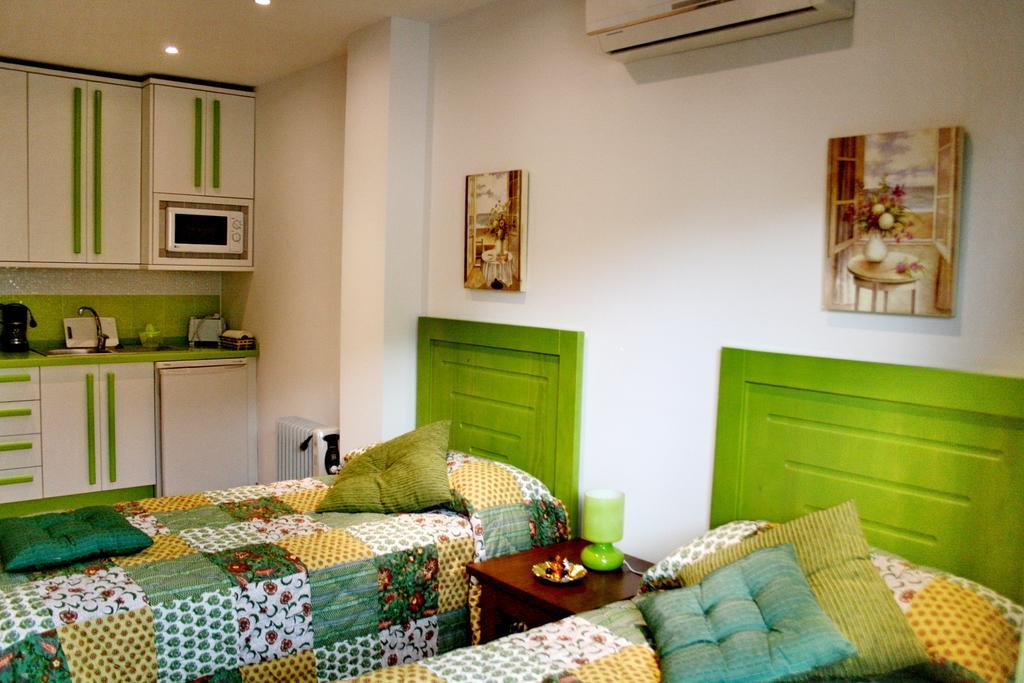 Apartamentos Turisticos Mirayuste กวาดาลูเป ห้อง รูปภาพ