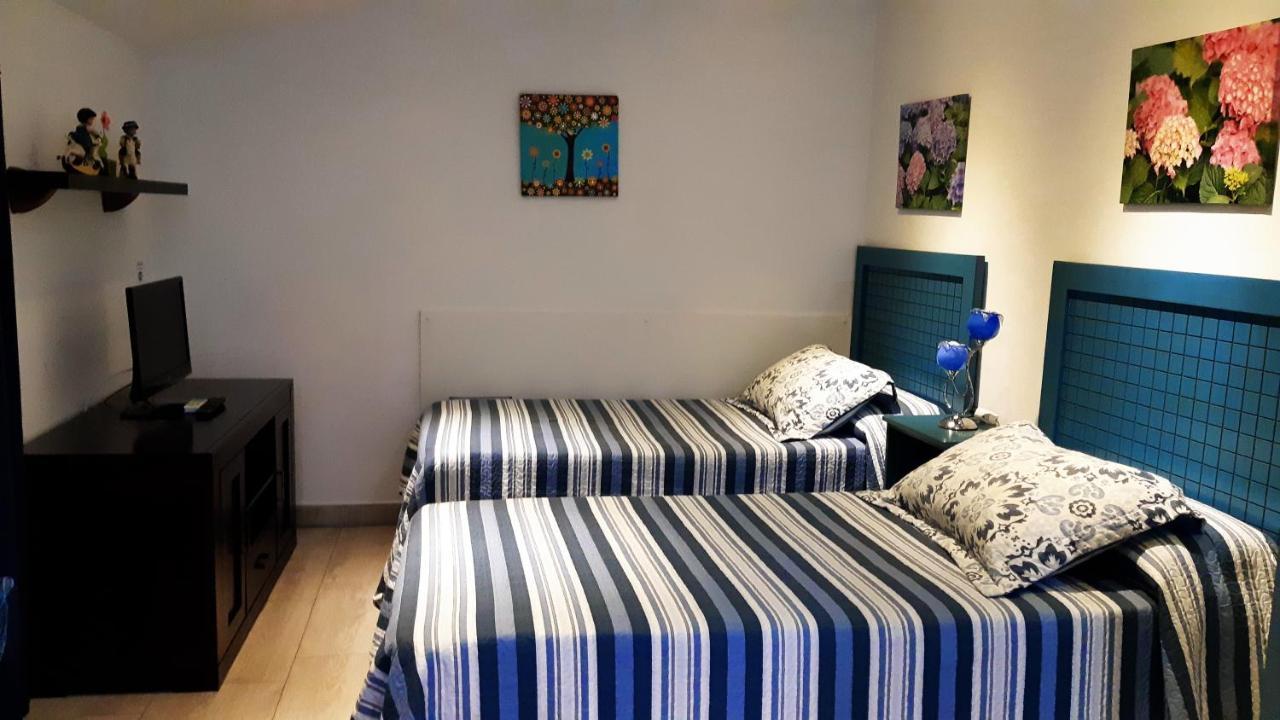 Apartamentos Turisticos Mirayuste กวาดาลูเป ภายนอก รูปภาพ
