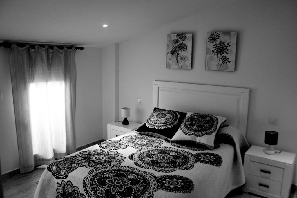 Apartamentos Turisticos Mirayuste กวาดาลูเป ภายนอก รูปภาพ